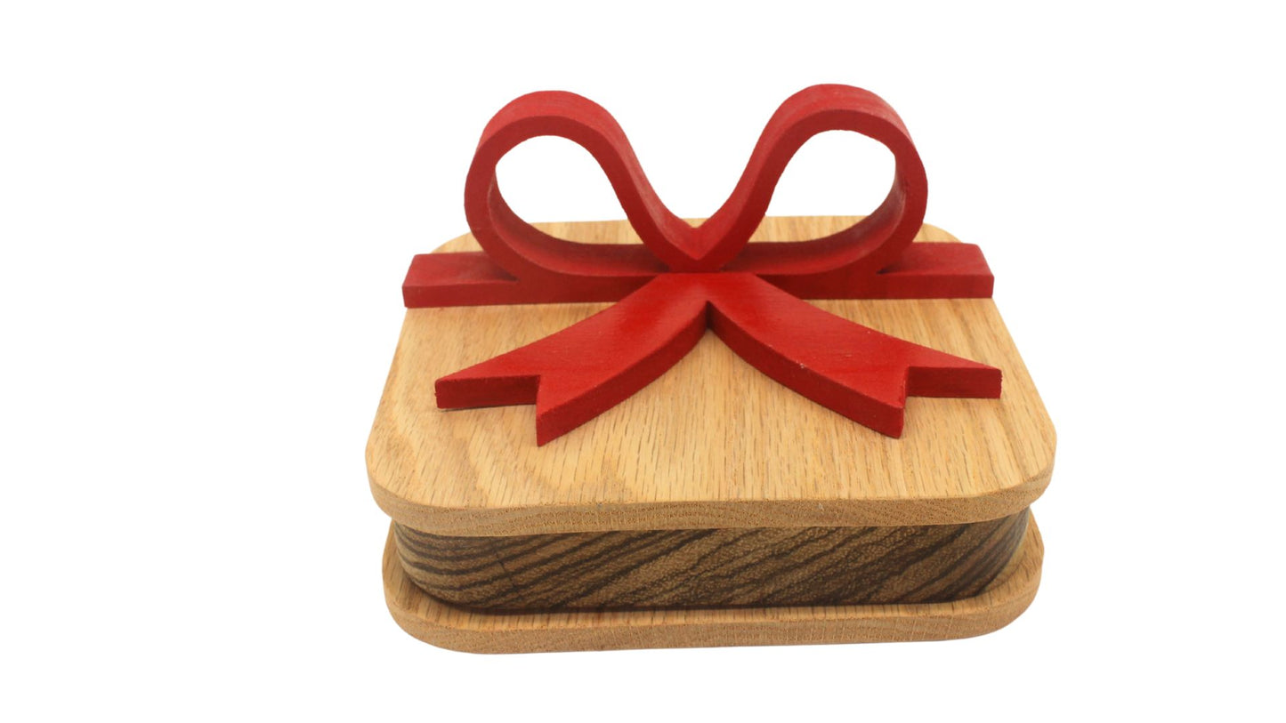 Wooden gift box with red wooden bow