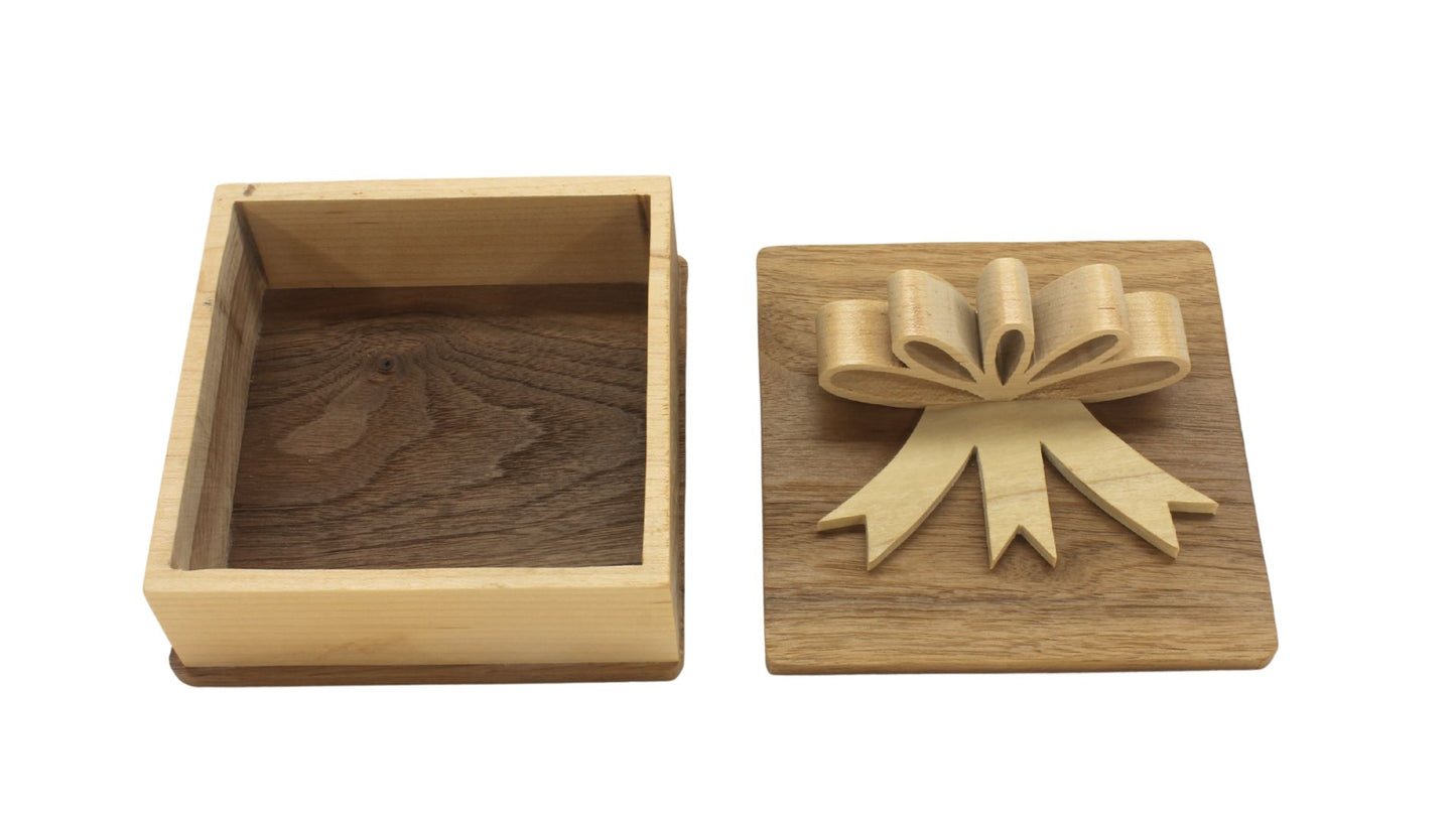 Square wooden box with wooden bow