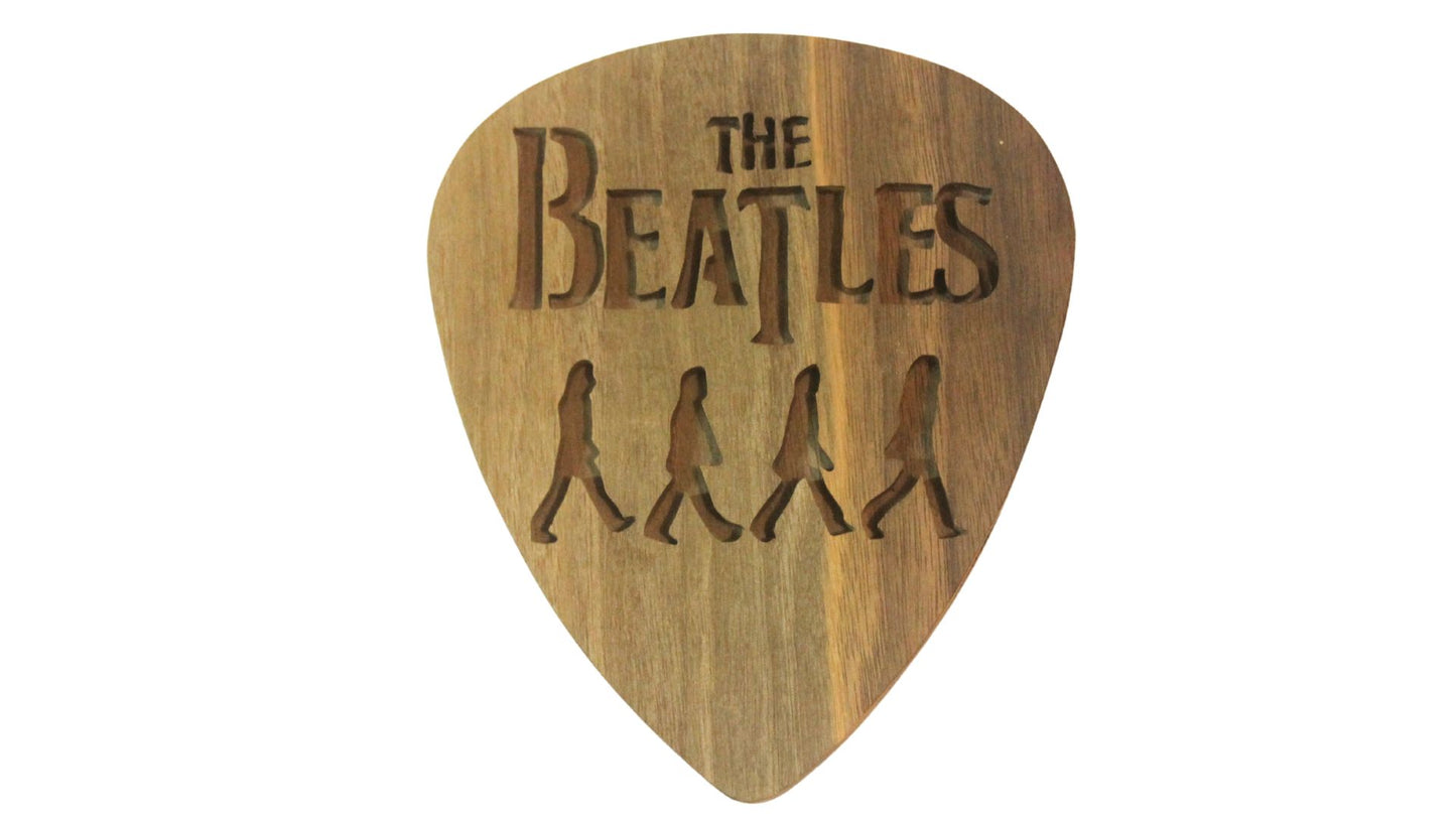 Beatles crossing Abbey Road on giant guitar pick shape, choice of oak or cherry. Decoration only, cannot be used as an actual guitar pick