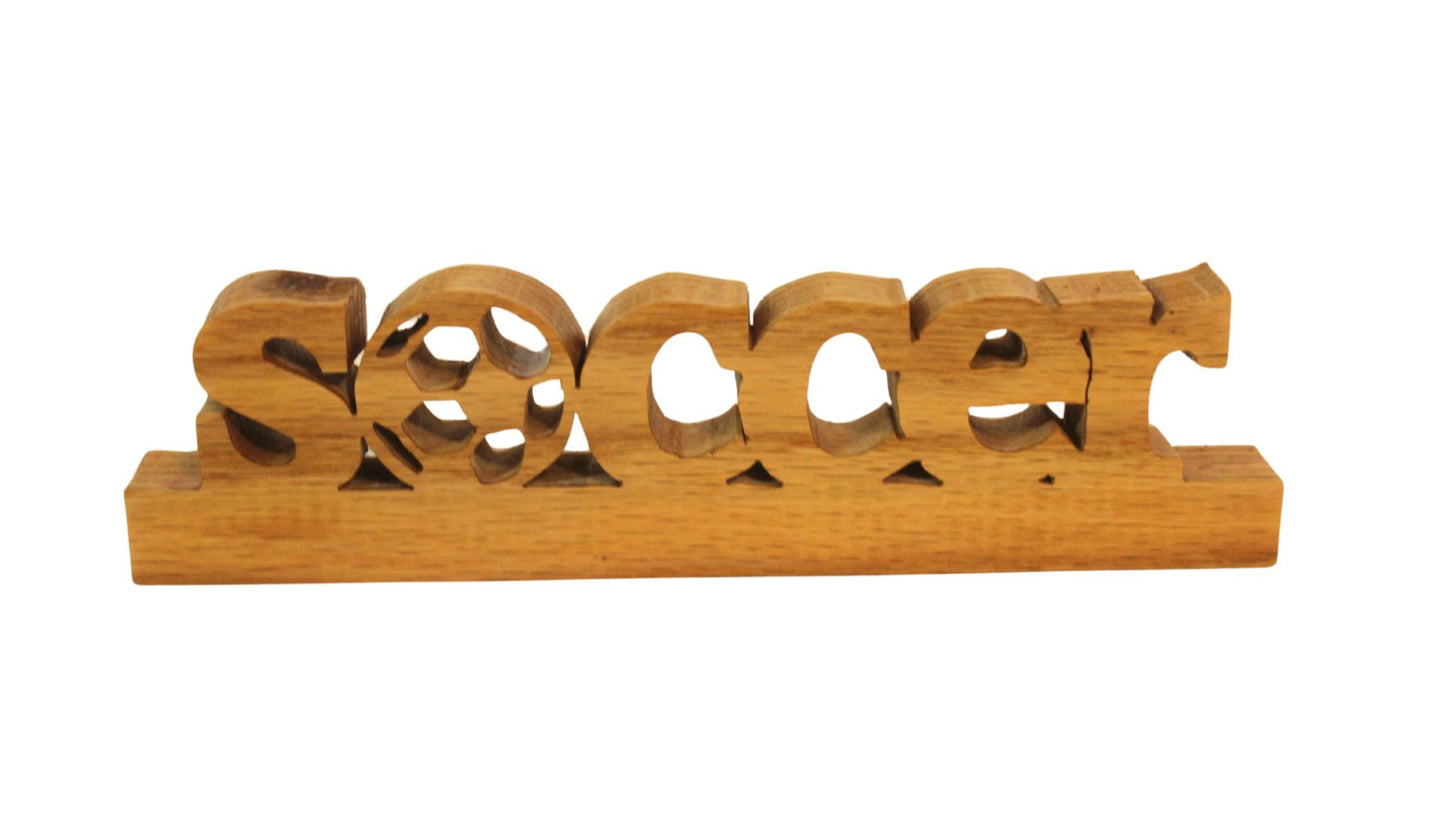Soccer desk sign, soccer ball for the letter “o,” hand cut from oak. Great gift item
