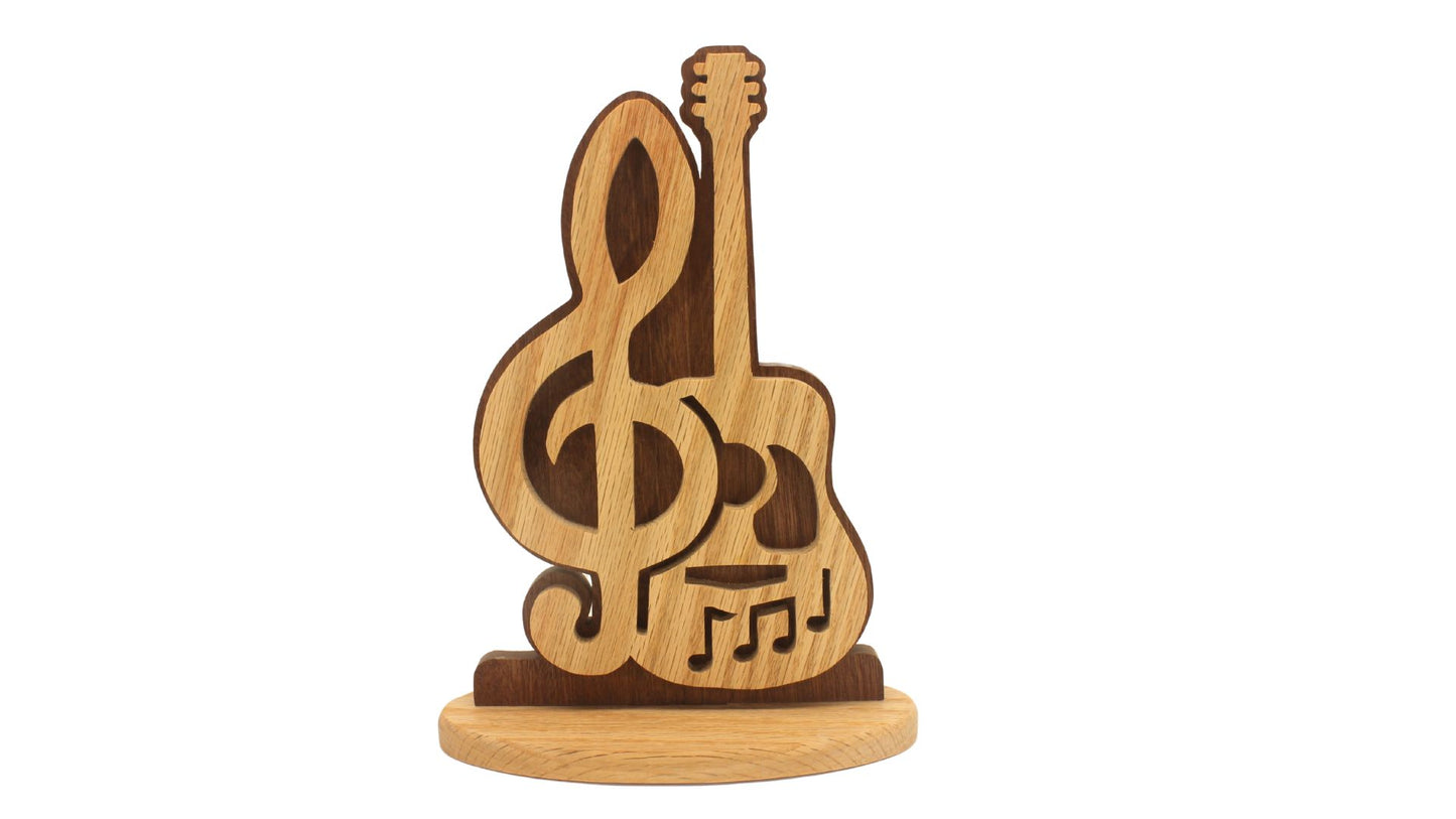 Guitar music display. Choice of stand or wall hanging. Cut by hand from oak and sapele