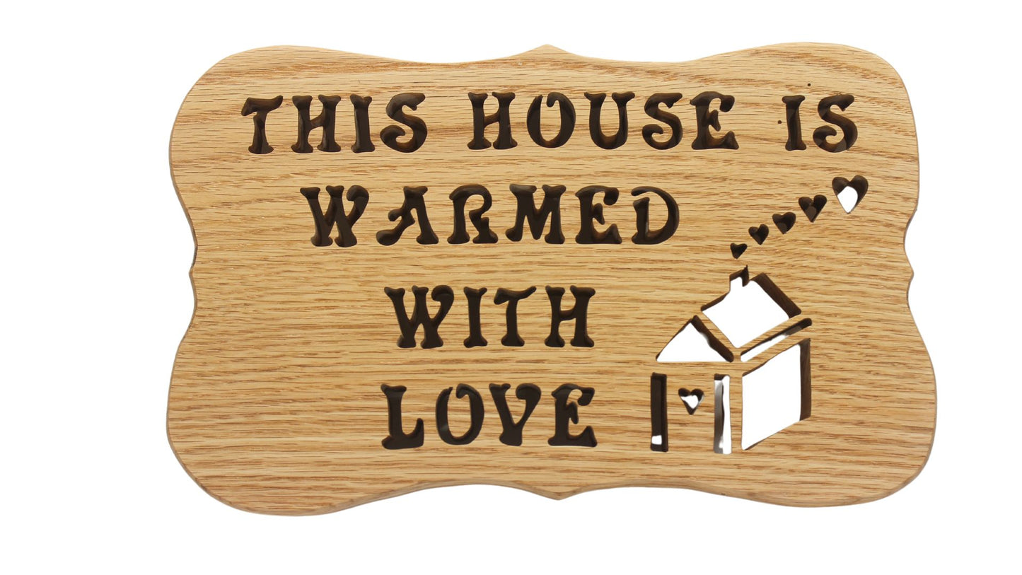 This House Is Warmed With Love wall hanging