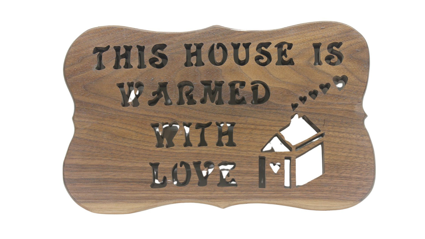 This House Is Warmed With Love wall hanging