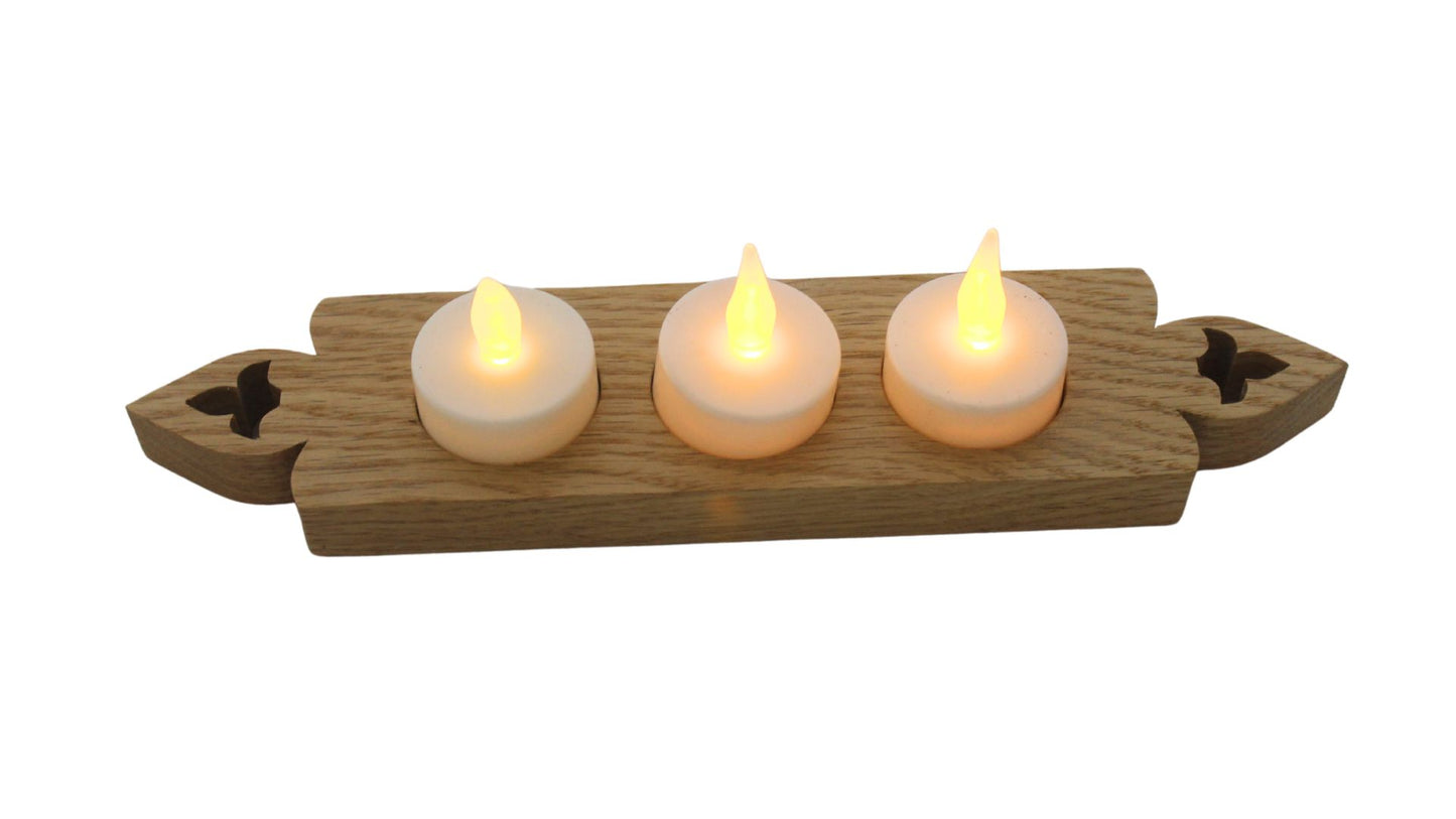 Candle holder with three electric candles