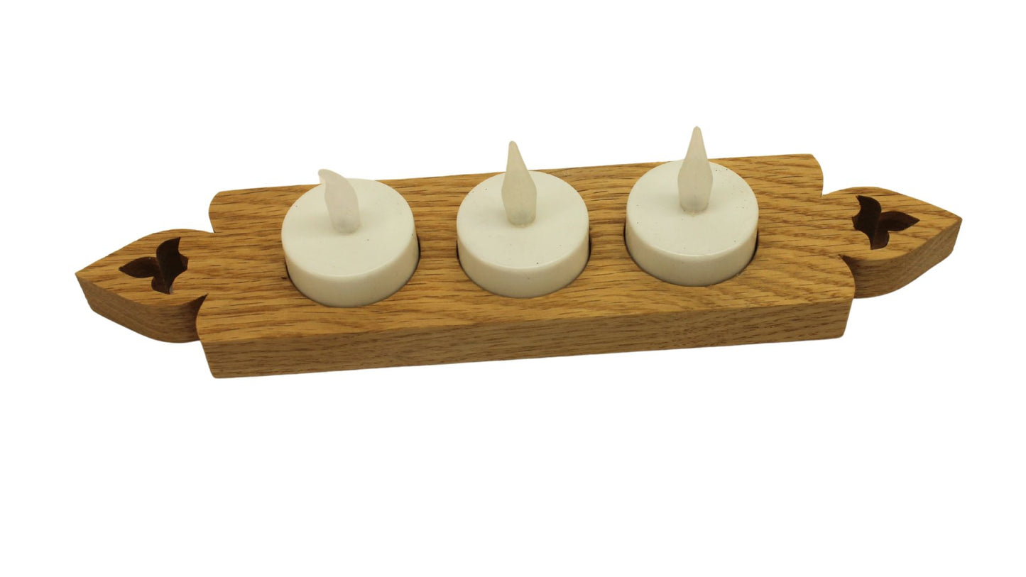 Candle holder with three electric candles