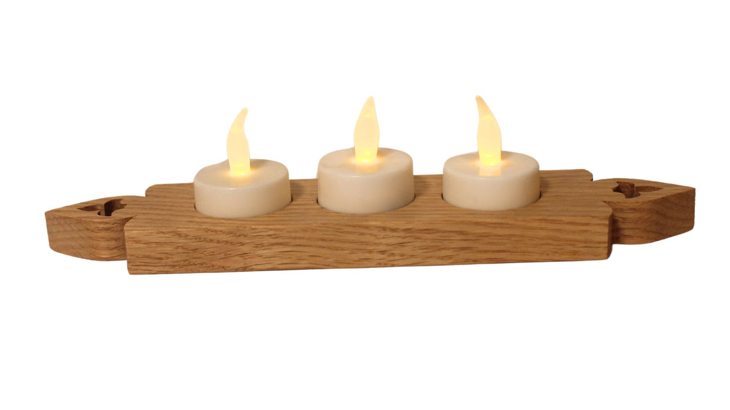 Candle holder with three electric candles