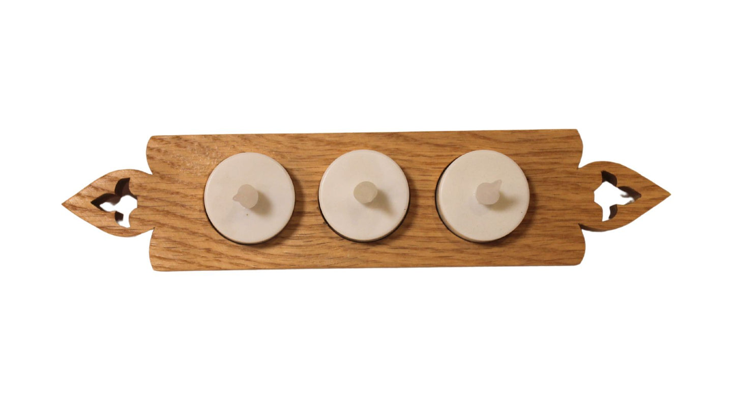 Candle holder with three electric candles