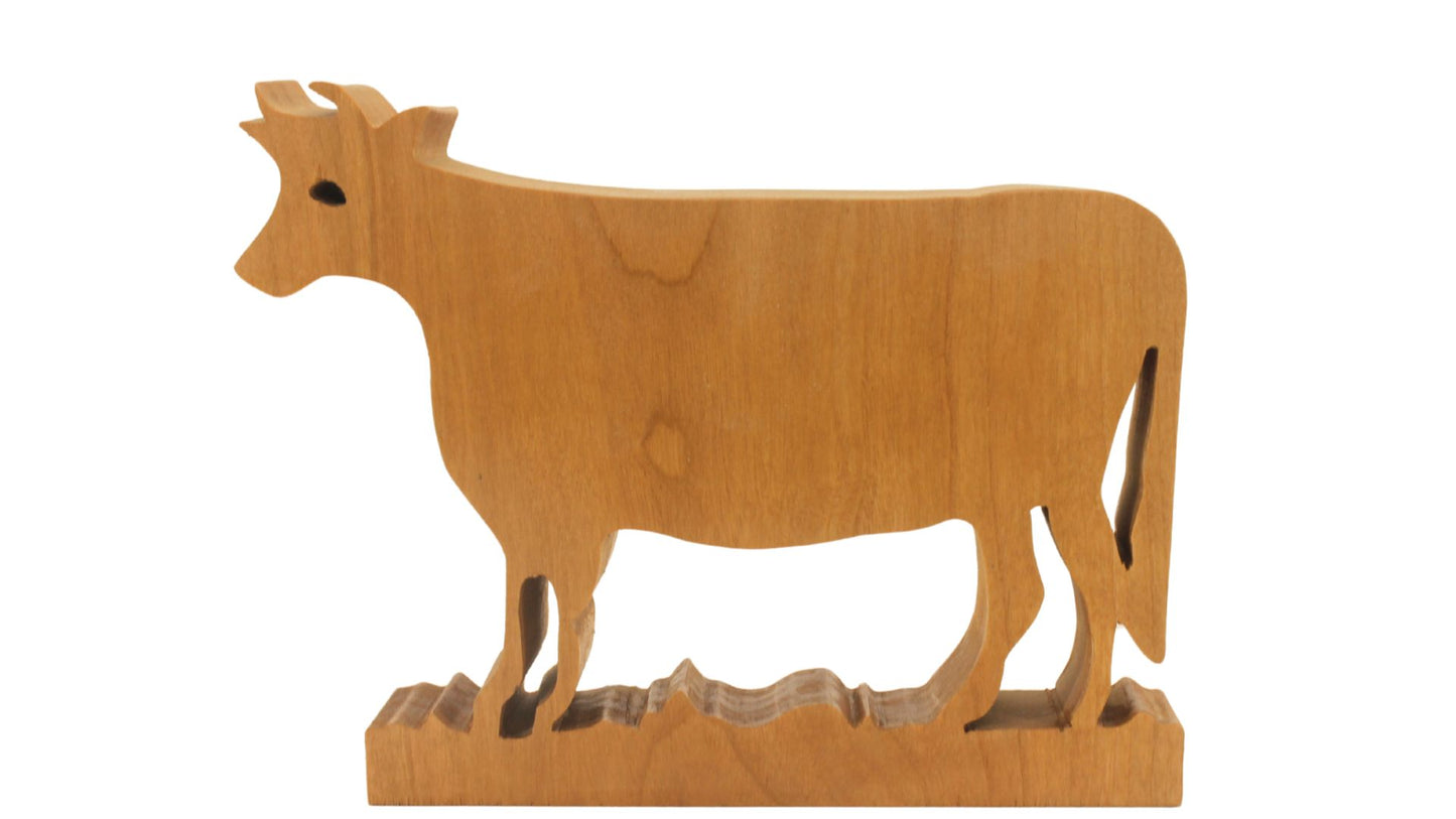 Nativity set, freestanding figures and animals. Mary, Joseph, baby Jesus, shepherd, kings, donkey, cow, camel. Hand cut from hardwoods