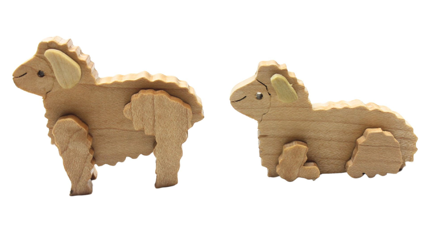 Nativity set with barn and figures. Mary, Joseph, baby Jesus in a manger. Includes angel, shepherds, three kings, sheep, camel, donkey, cow