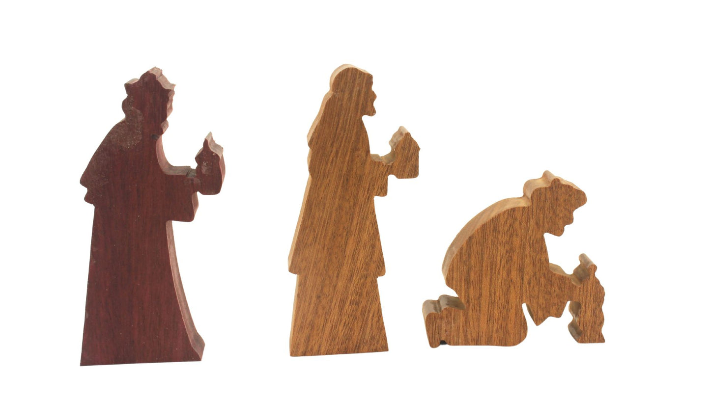 Multi-piece wood nativity with stable and figures, town of Bethlehem in the background