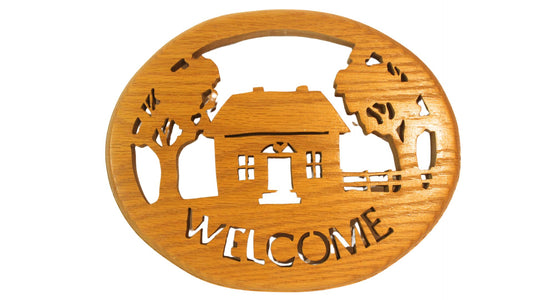 Oval welcome sign, hand cut from solid oak. This makes a great entry door or hall wall hanging