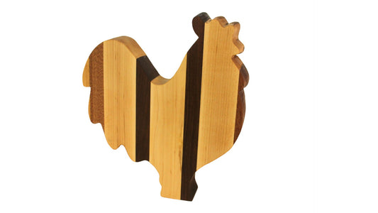 Cutting board. This thick rooster shape is much more fun than a boring rectangle. Handmade from hardwoods with a food safe wax finish