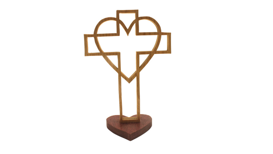 Cross surrounded by a heart on a heart-shaped base