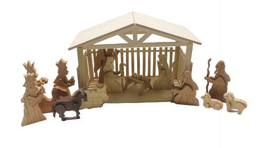 Nativity set with barn and figures. Mary, Joseph, baby Jesus in a manger. Includes angel, shepherds, three kings, sheep, camel, donkey, cow