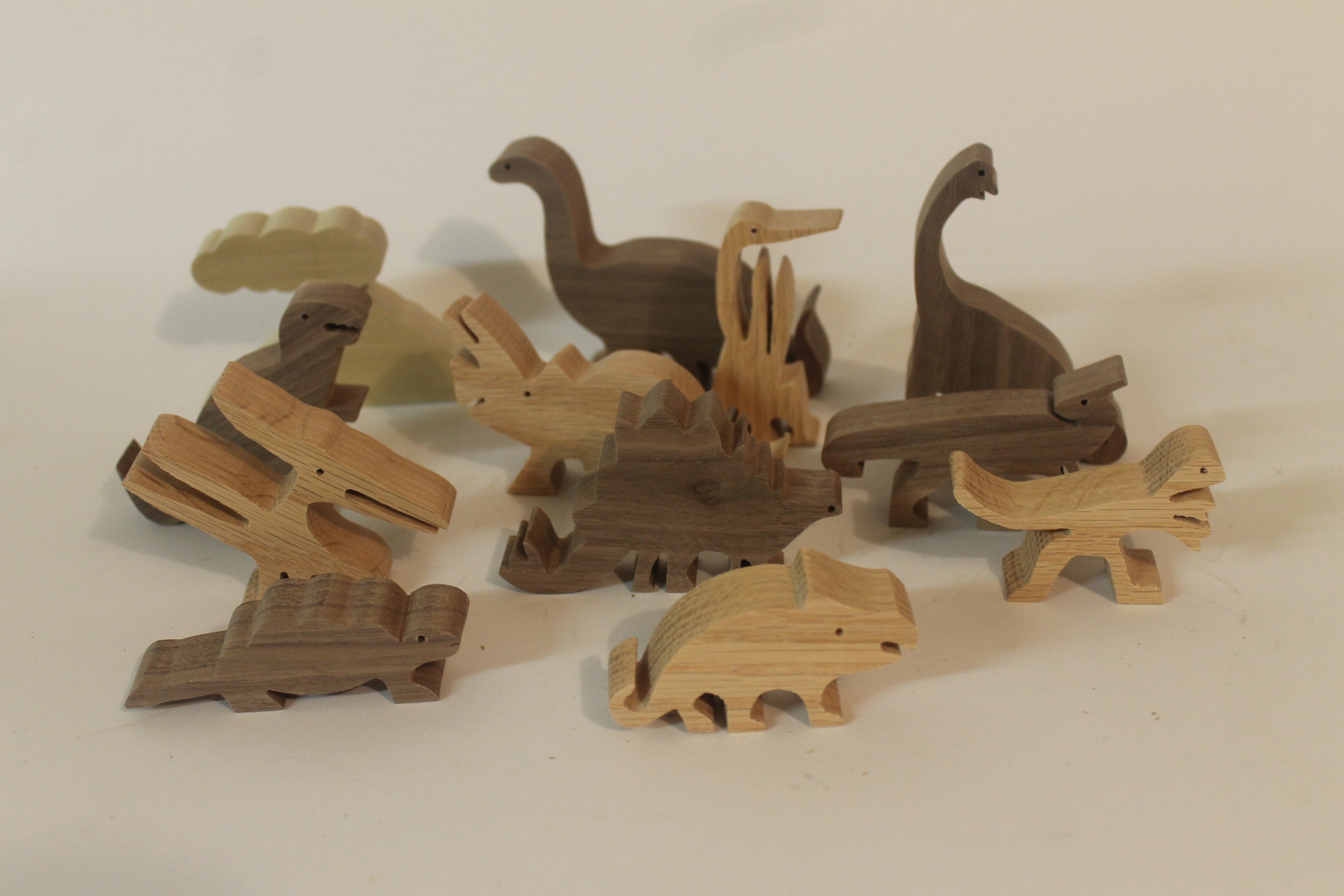 Children love dinosaurs, so we make several sets to choose from. All are cut by hand, and finished with a child safe oil.