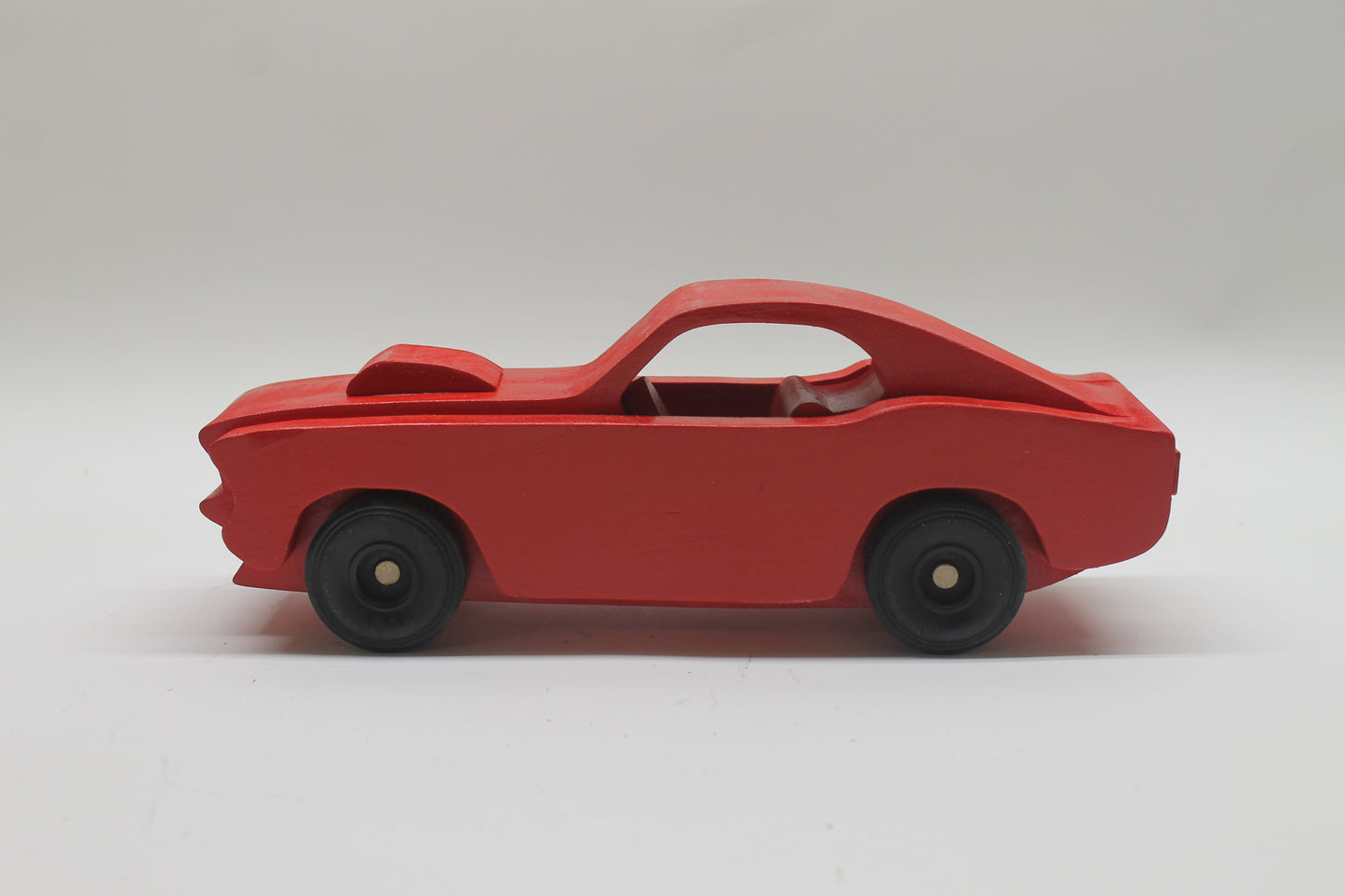 Handcrafted 1969 Mustang Fastback Model in Solid Hardwood. Choice of Red or Yellow