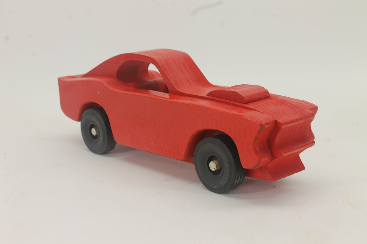 Handcrafted 1969 Mustang Fastback Model in Solid Hardwood. Choice of Red or Yellow