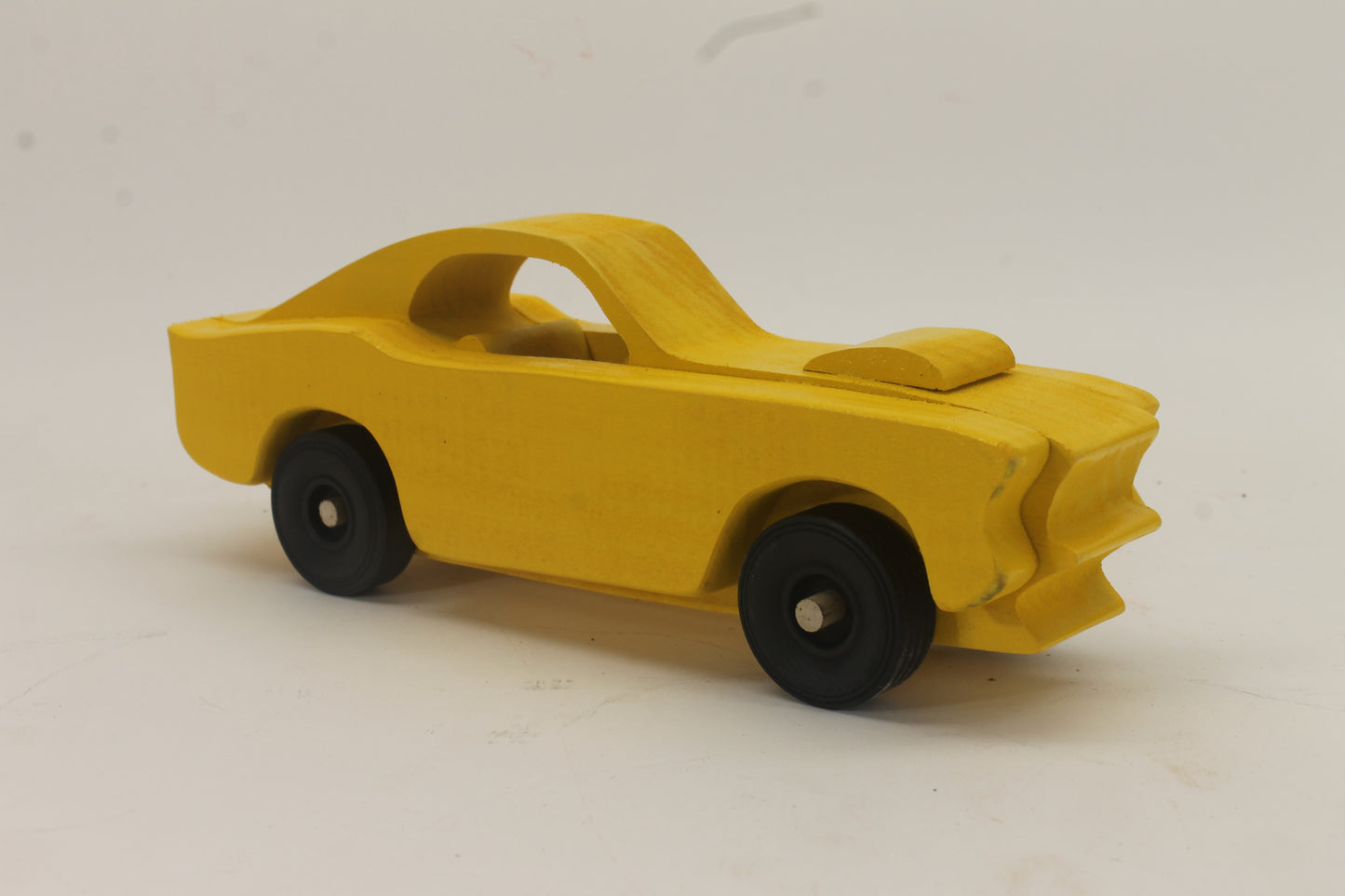 Handcrafted 1969 Mustang Fastback Model in Solid Hardwood. Choice of Red or Yellow