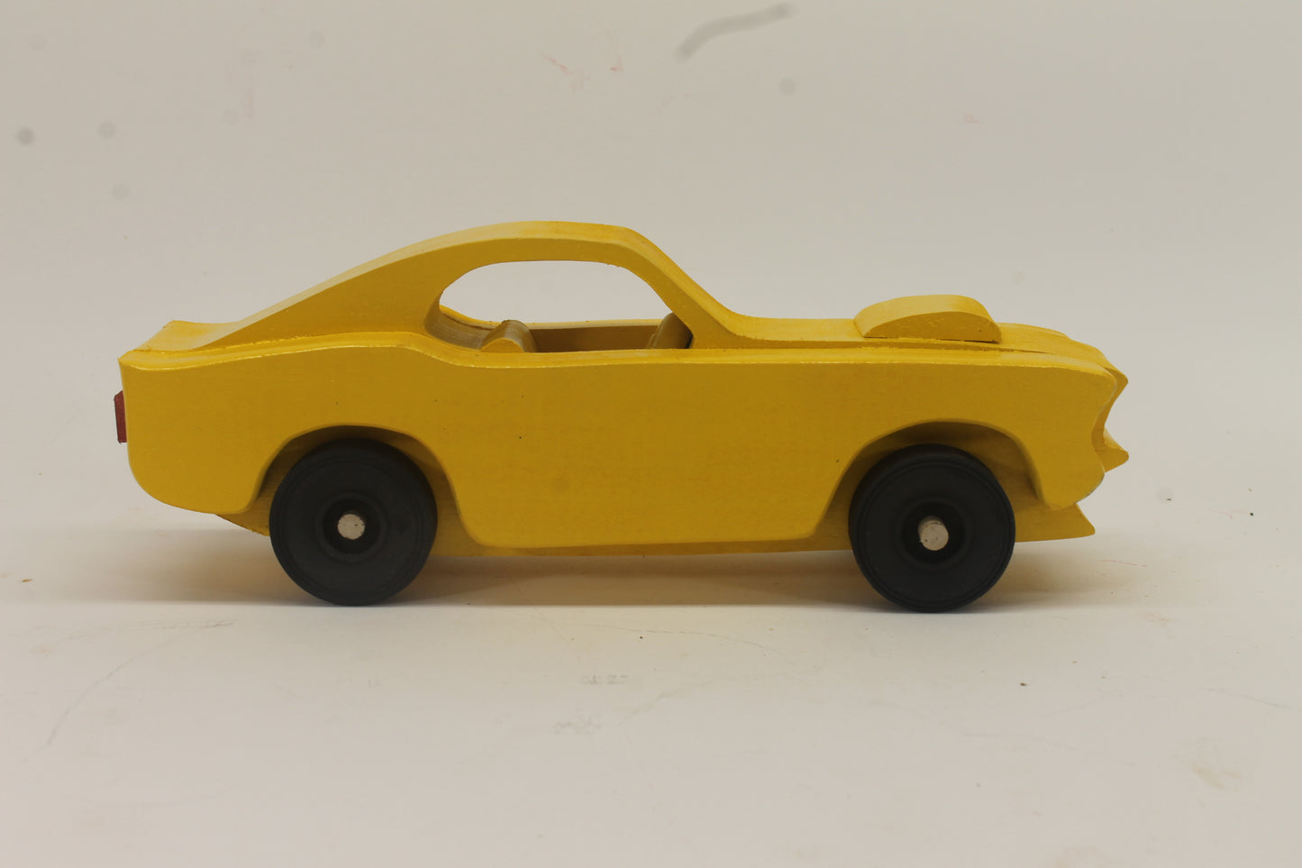 Handcrafted 1969 Mustang Fastback Model in Solid Hardwood. Choice of Red or Yellow