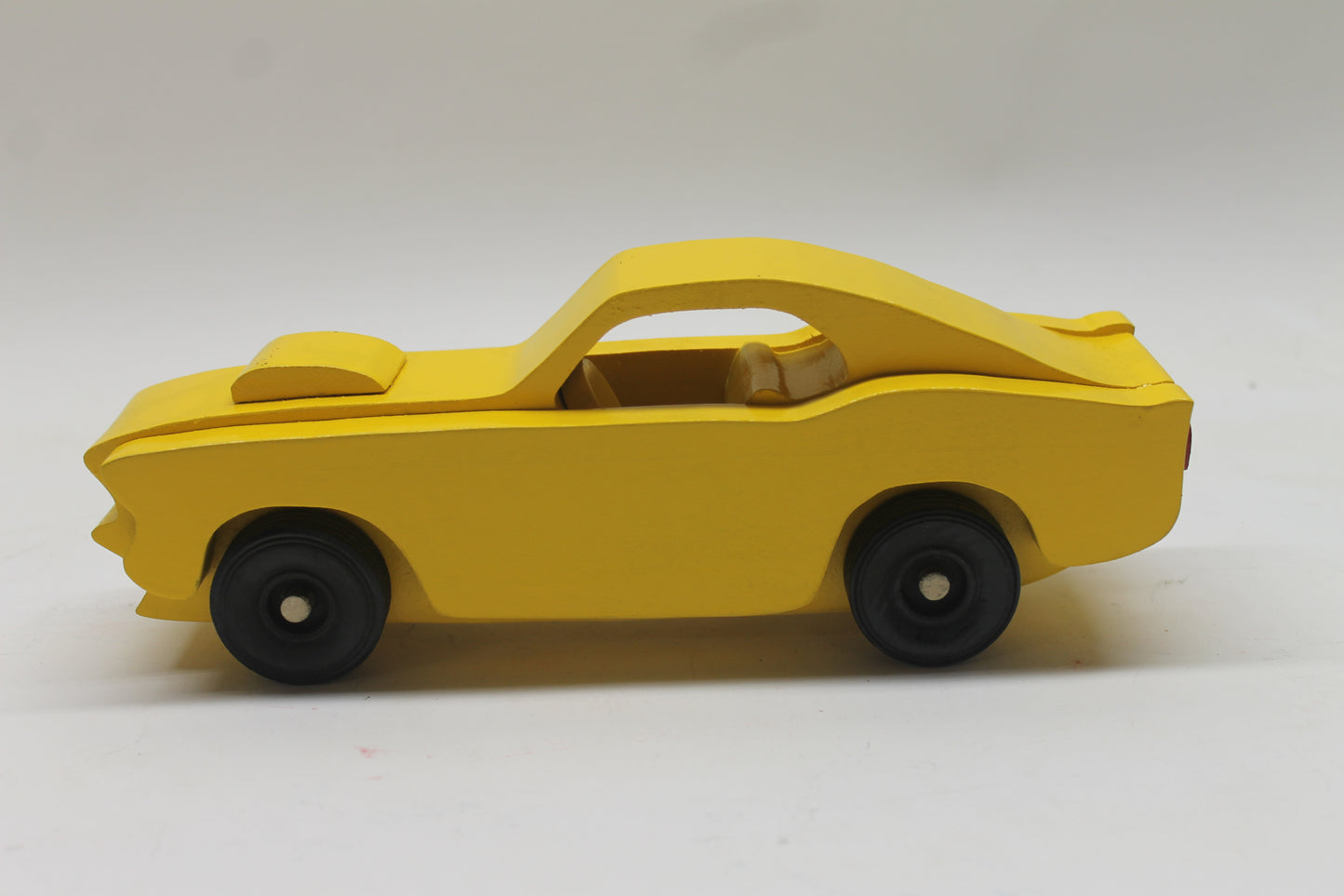 Handcrafted 1969 Mustang Fastback Model in Solid Hardwood. Choice of Red or Yellow